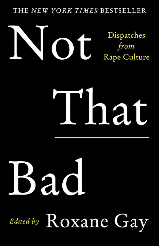 The black book cover for Not That Bad has the title and author's name written in white and some yellow, creating a high contrast with the black background.