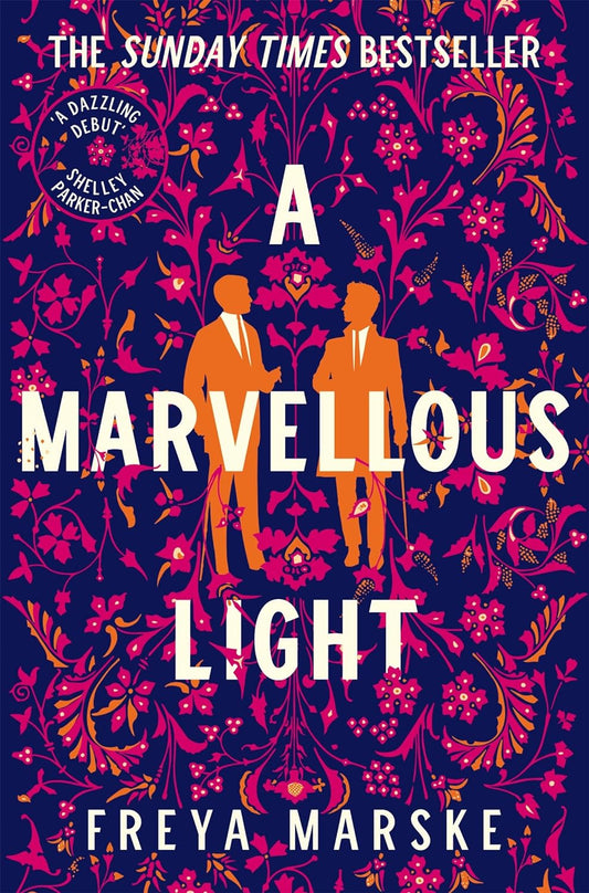 The purple book cover for A Marvellous Light has two orange silhouettes of Edwardian men looking at one another. Surrounding them is a pattern of pink and orange plants.