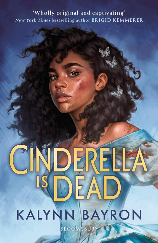 A black teenage girl  with scratches over her body wears a dirty, bloody blue ballgown. The title Cinderella is Dead overlays her in gold.