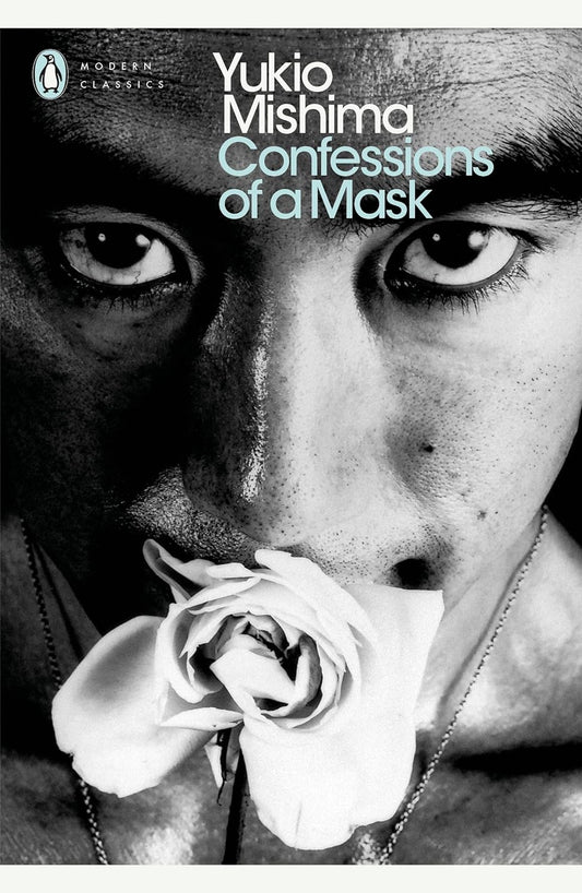 The book cover of Confessions of a Mask is a close-up photo of a man holding a rose in his mouth. He stares directly at the viewer.