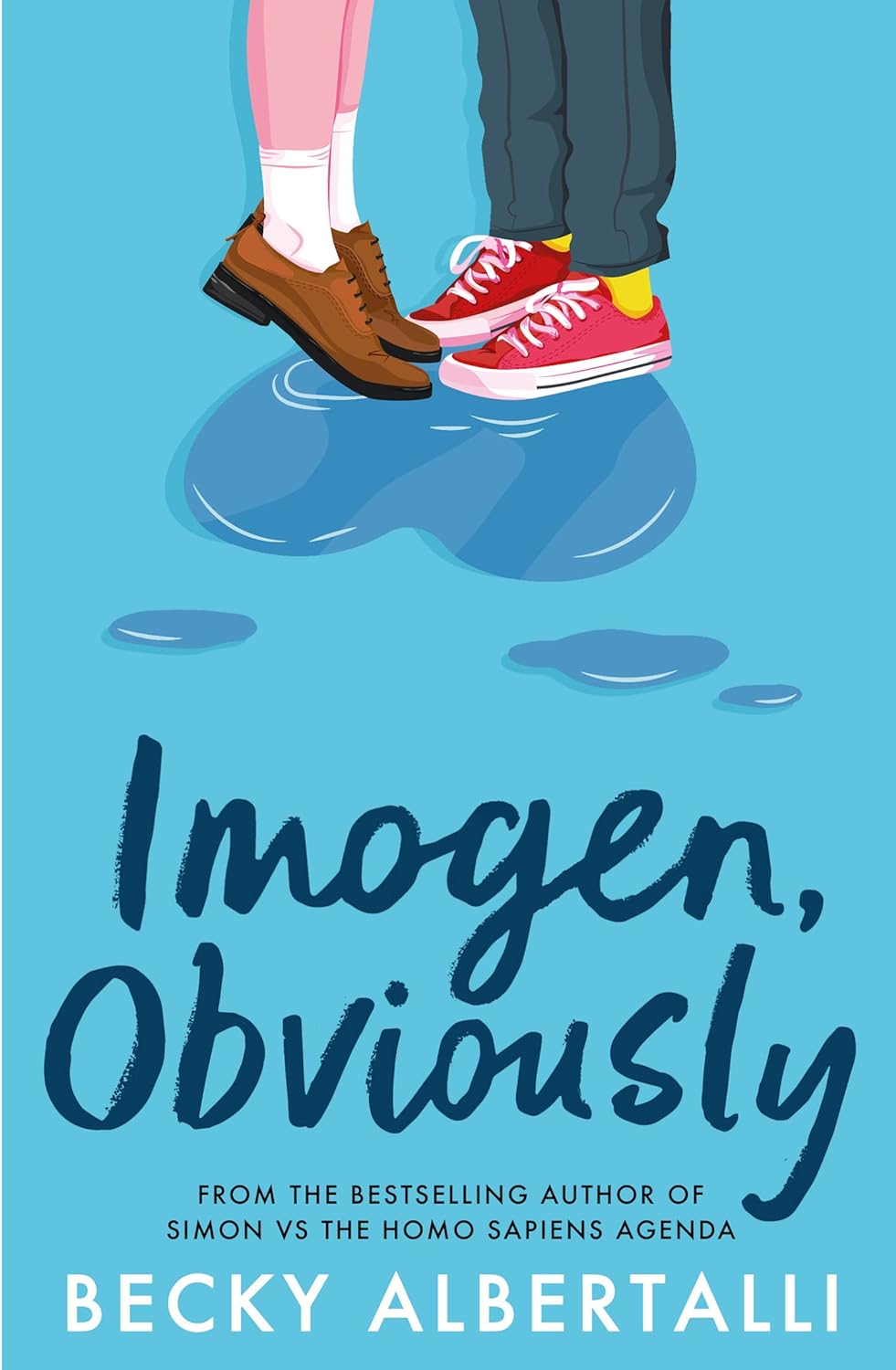 The blue book cover for Imogen, Obviously. We can see from the ankle down two people stood side by side in a puddle of water shaped like a heart.