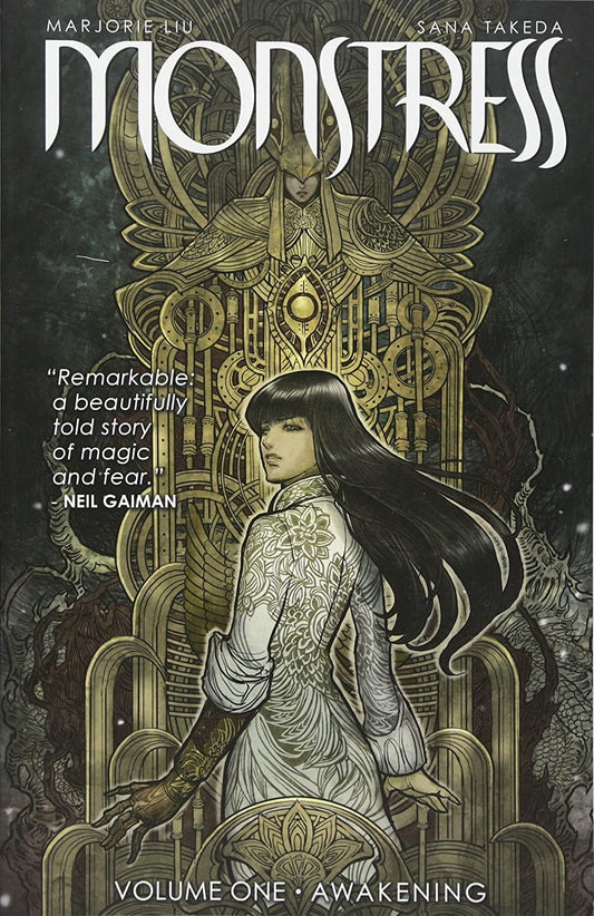 The dark book cover for Monstress shows an Asian teenage girl with long dark hair standing in front of a golden statue.