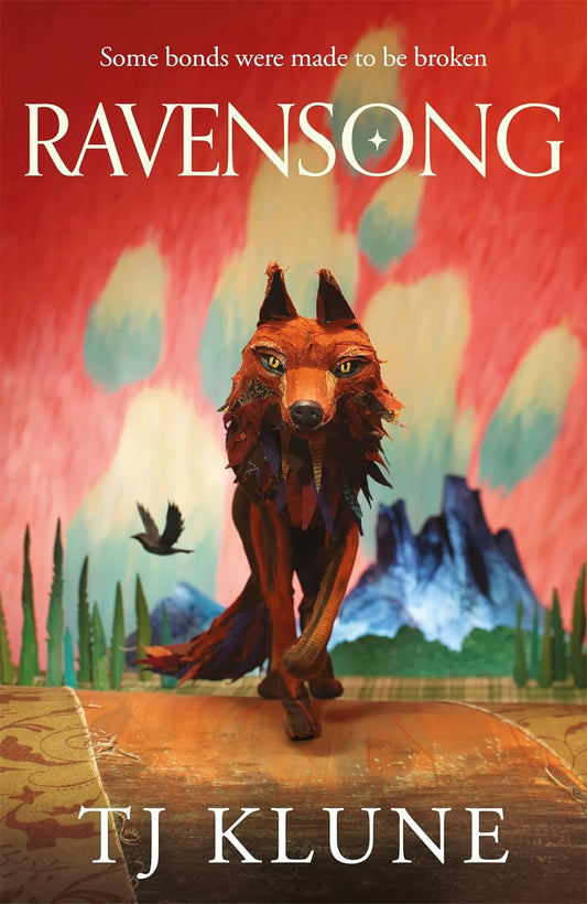 The book cover for Ravensong shows a red wolf walking towards the viewer with a mountain in the distance behind it. White text reads "Some bonds were made to be broken".