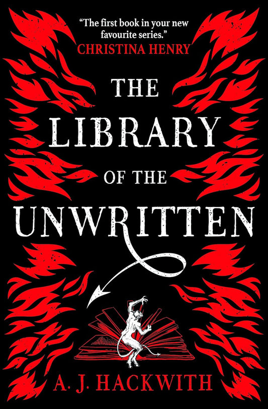 The black book cover for The Library of the Unwritten has red flames dancing around the covers edge. At the base is an open book with the devil opening its pages.