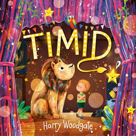 The book cover for Timid shows a lion and a young, ginger child, stood on a glittering stage. Both of them are anxious.